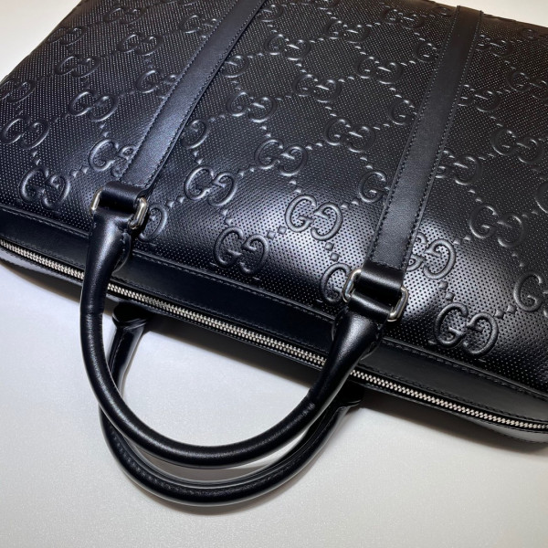 G*u*i gg embossed briefcase