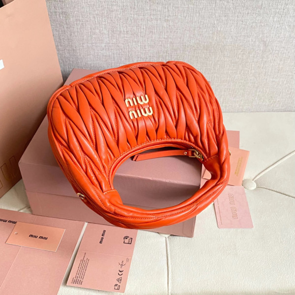 M*um*u wander matelassé nappa leather hobo bag